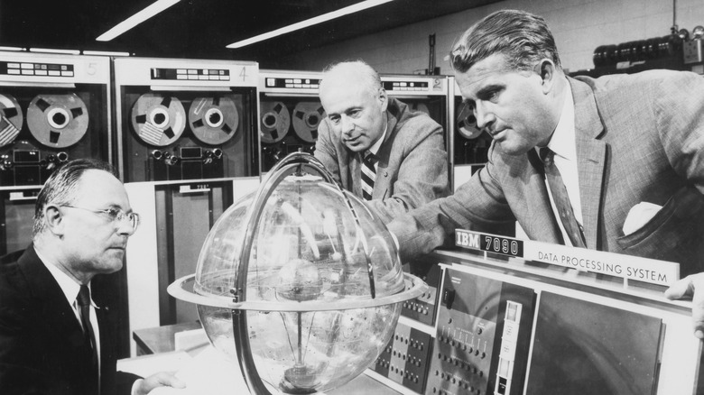 wernher von braun speaking to others in control room