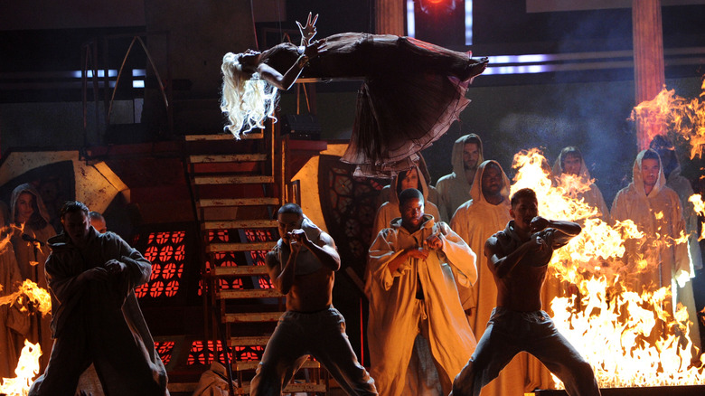 Nicki Minaj levitating over dancers