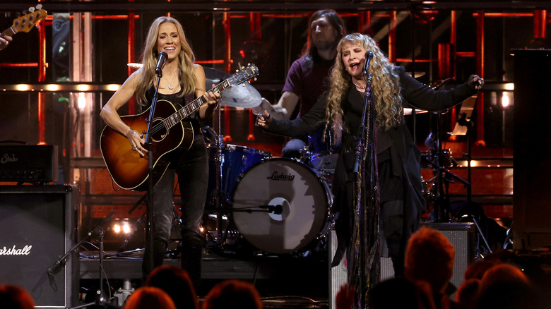 Sheryl Crow and Stevie Nicks performing onstage at the 2023 Rock and Roll Hall of Fame