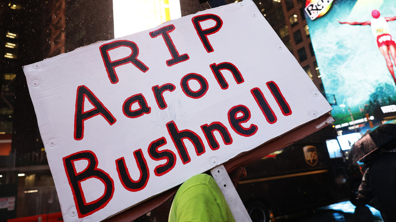 sign reading RIP Aaron Bushnell 