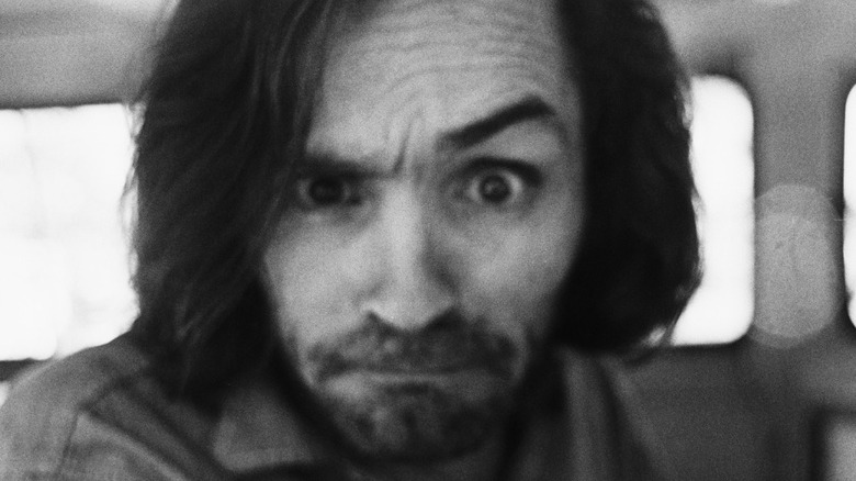 Charles Manson looking into camera