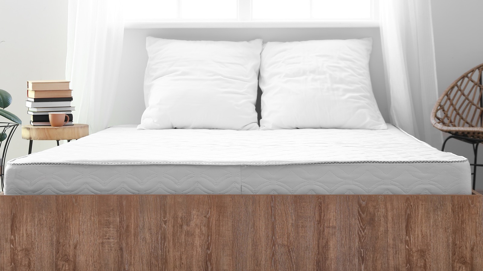 The Gross Reason You're Never Really Alone If You're Sleeping On An Old