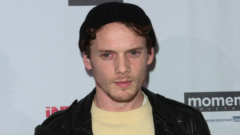 Anton Yelchin posing for camera