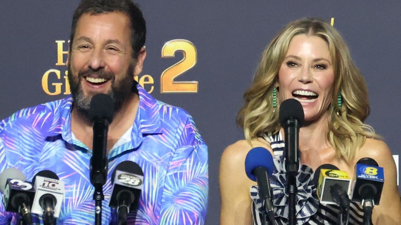 Adam Sandler and Julie Bowen laughing at Happy Gilmore 2 presser