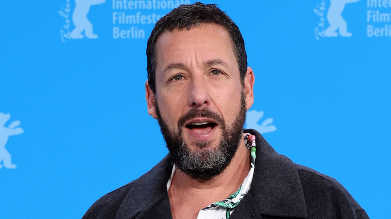 Adam Sandler looking out with mouth open