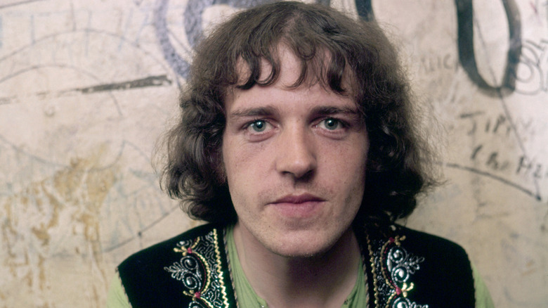 Joe Cocker wearing a black embroidered vest in 1968