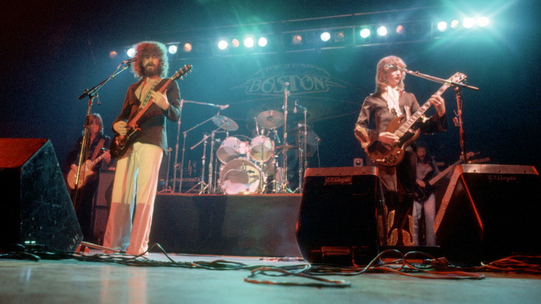 boston performs on large empty stage in the 1970s