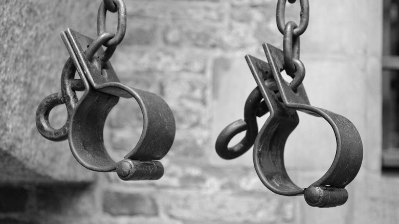Metal chains manacles dangling