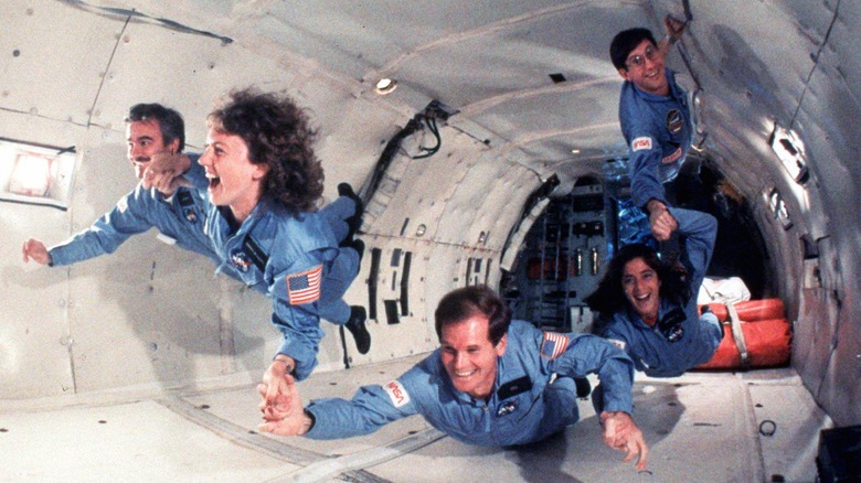 challenger crew smiling zero-g training