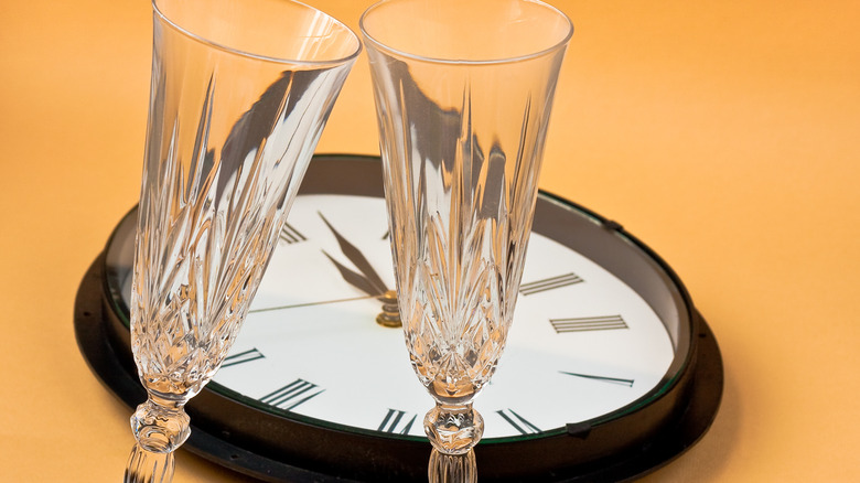 New Year's clock and champagne glasses