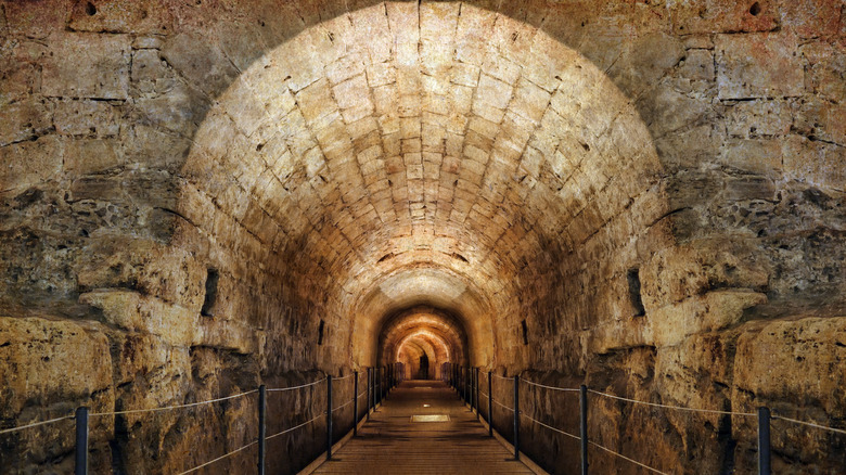 an underground tunnel with walkway 