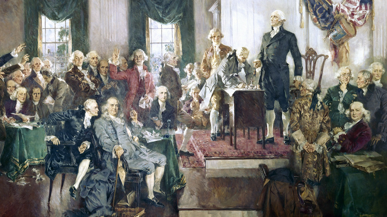 Franklin sits in front of Washington