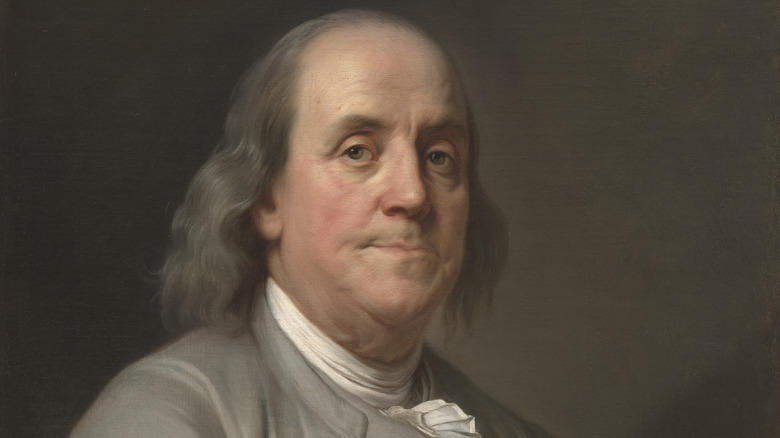 Benjamin Franklin looks up