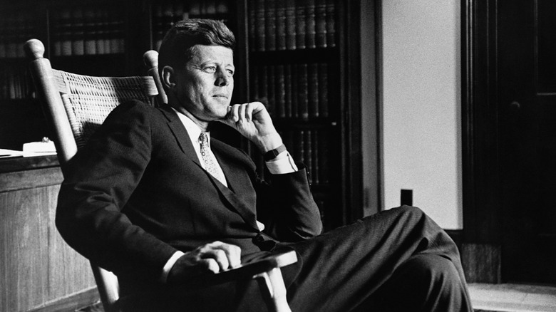 JFK sitting in rocking chair 