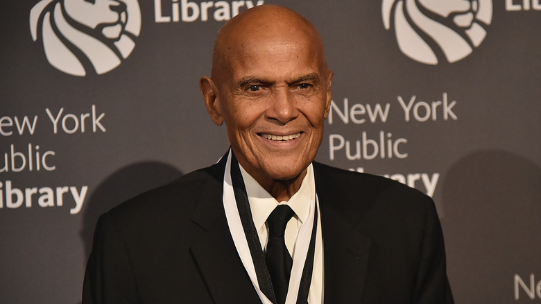 Harry Belafonte wearing medal smiling