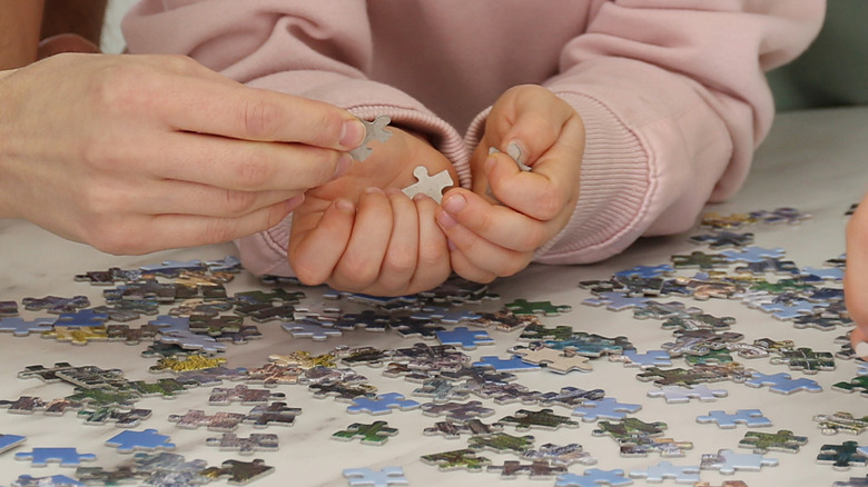 Playing with a jigsaw puzzle