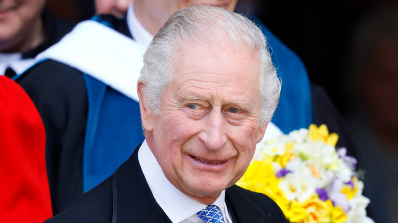 King Charles III smiling