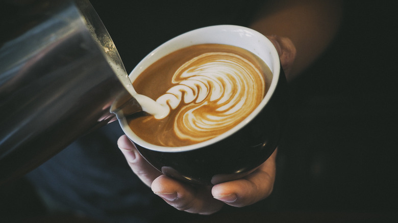 Barista making latte art