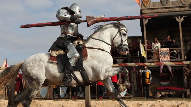 Knight on horse jousting