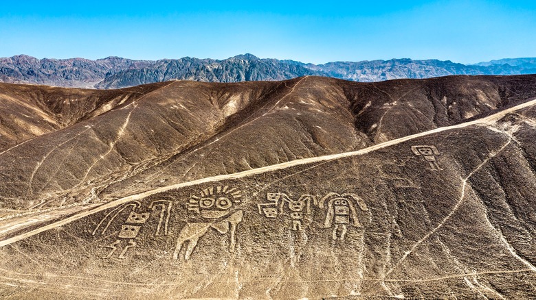 Human shaped Nazca geoglyphs on hill
