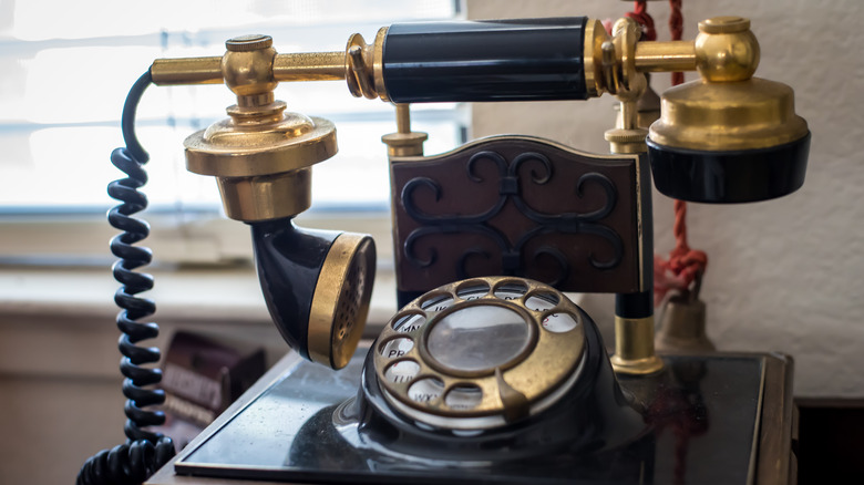 Vintage telephone unit on display