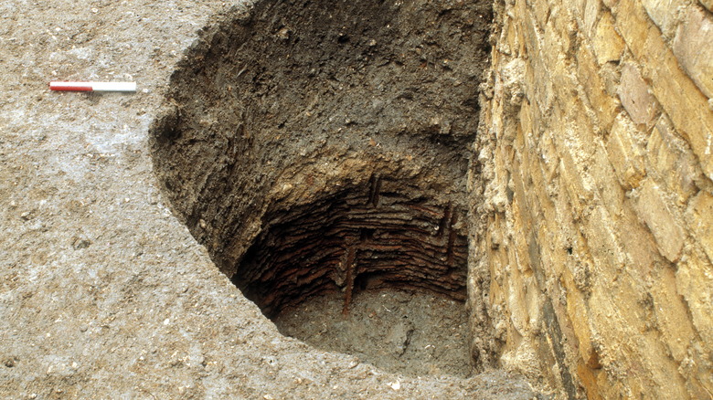 A medieval cesspit lined with bricks