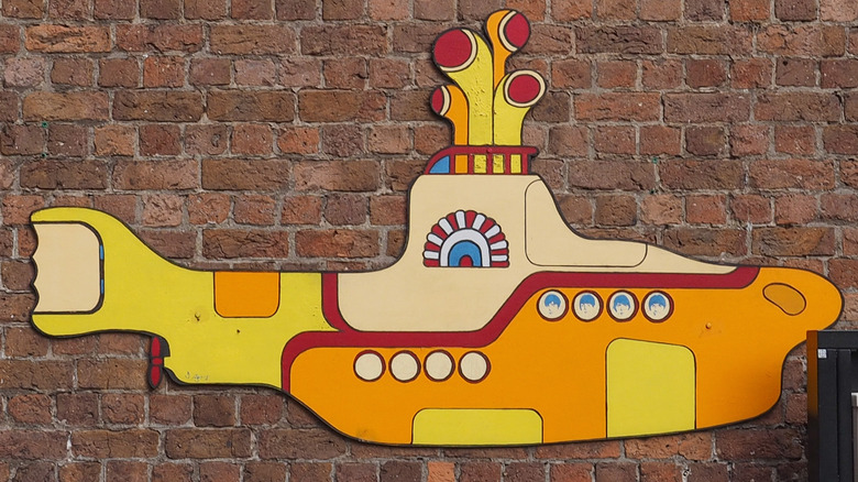 Yellow submarine decorates a brick wall