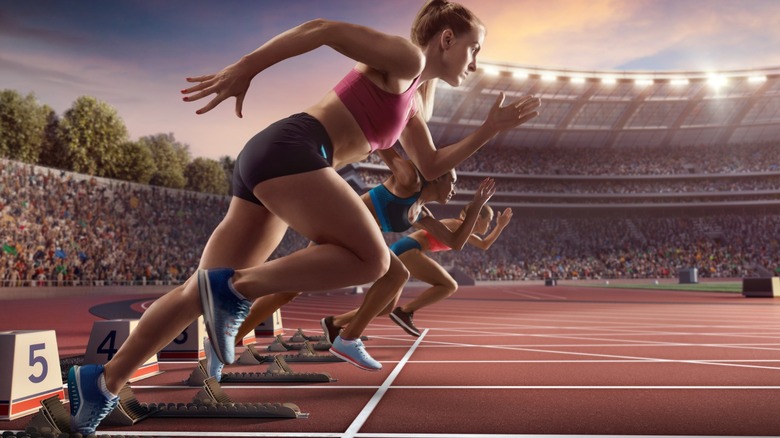 women sprinting on track