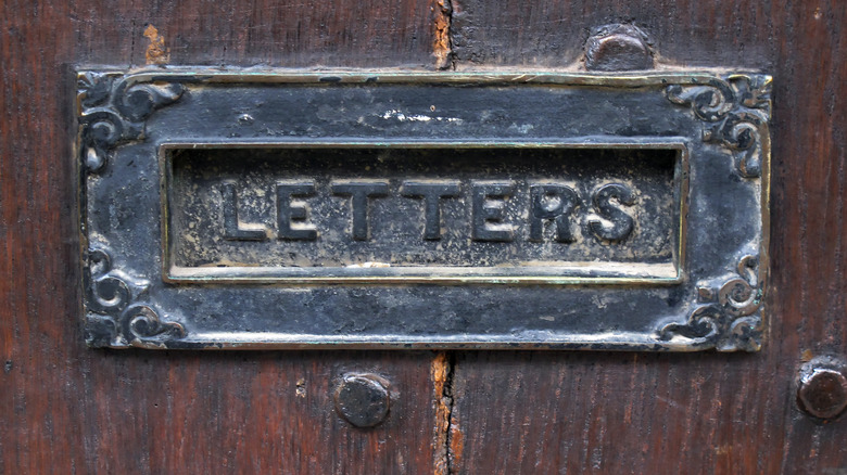 British letterbox in ancient door