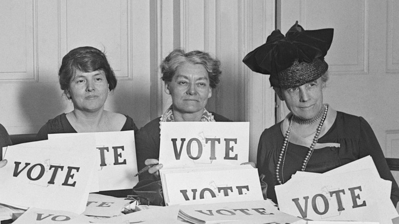 Suffrage activists encouraging voting