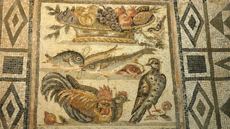 Roman cuisine mosaic showing fish, fruit, bird
