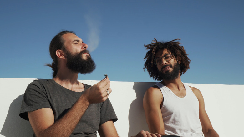 men smoking outdoors