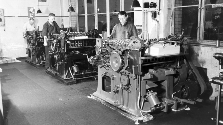 factory workers operating machinery