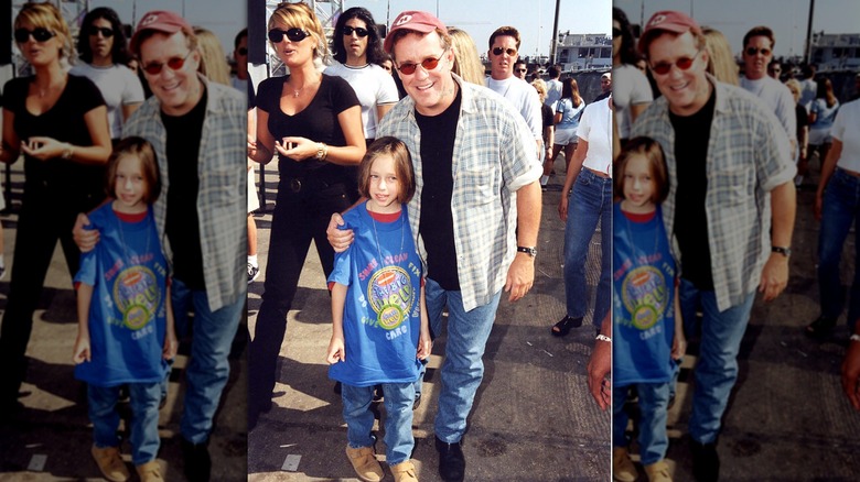 Phil Hartman poses with daughter