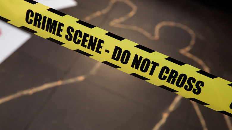 crime scene tape chalk outline