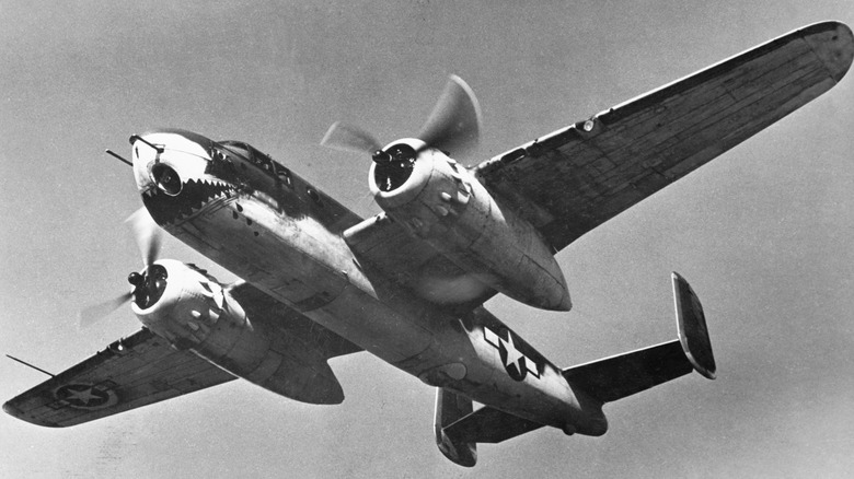 North American B-25 Mitchell with painted mouth in flight