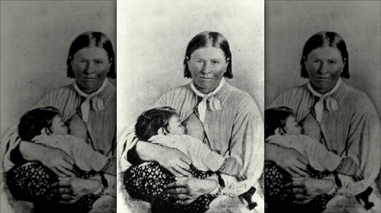 Parker holding daughter Topsannah