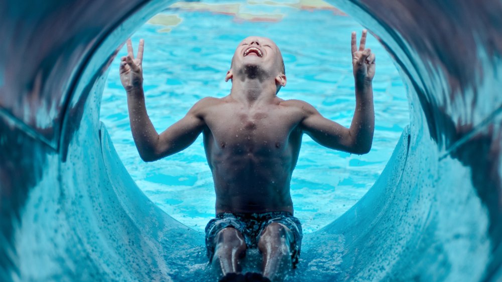 Boy about to tumble into a world of pain - at a pool