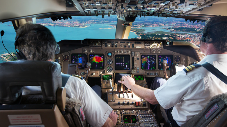 Two men piloting commercial plane