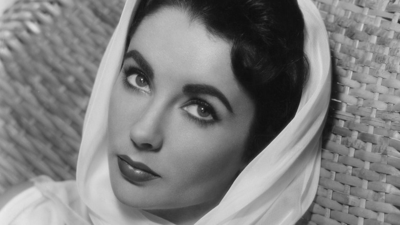 Elizabeth Taylor in white head scarf