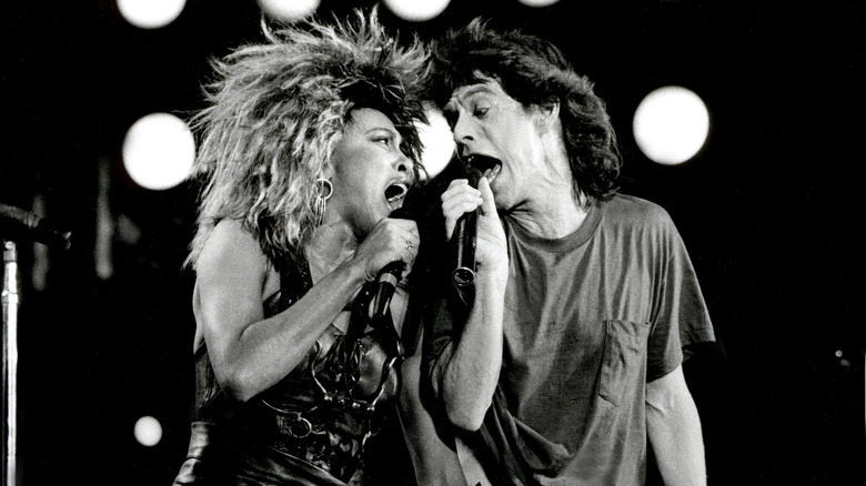 Tina Turner singing with Mick Jagger