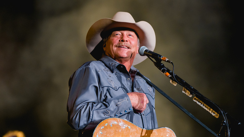 Alan Jackson on stage with a guiter in 2019