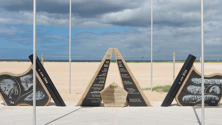 d day monument cloudy sky