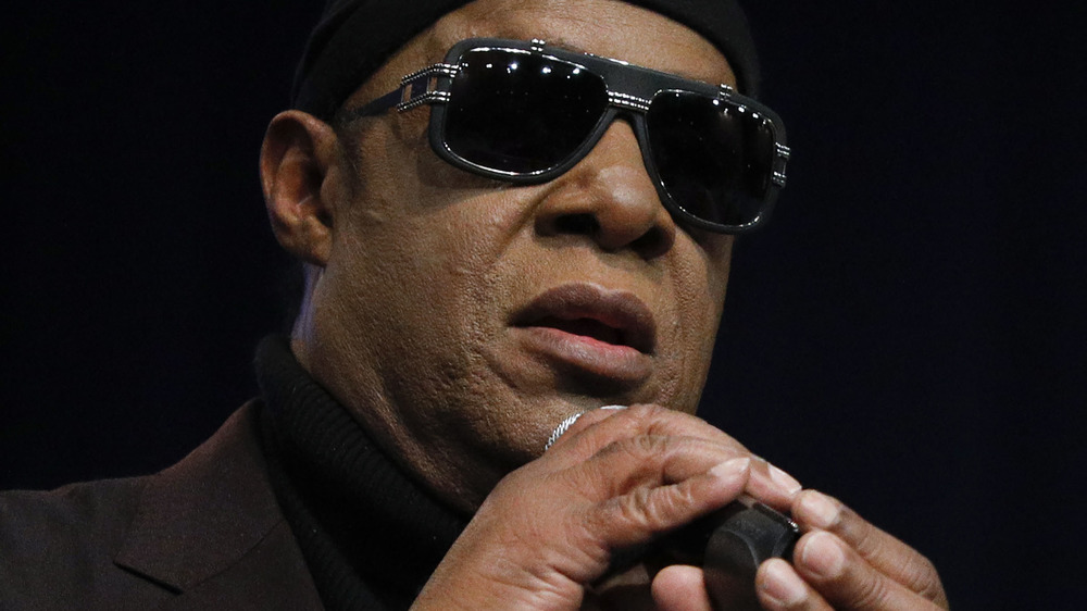 Stevie Wonder speaking into a microphone, 2019