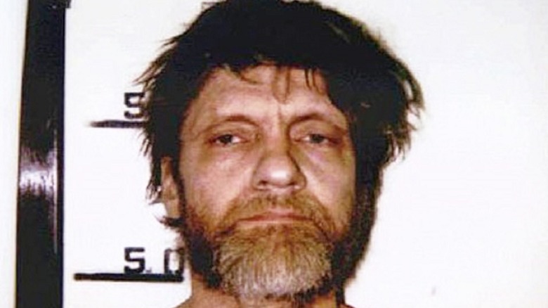 Ted Kaczynski posing for mugshot