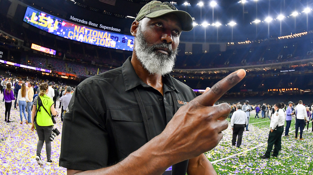 Karl Malone on the field after an LSU championship game