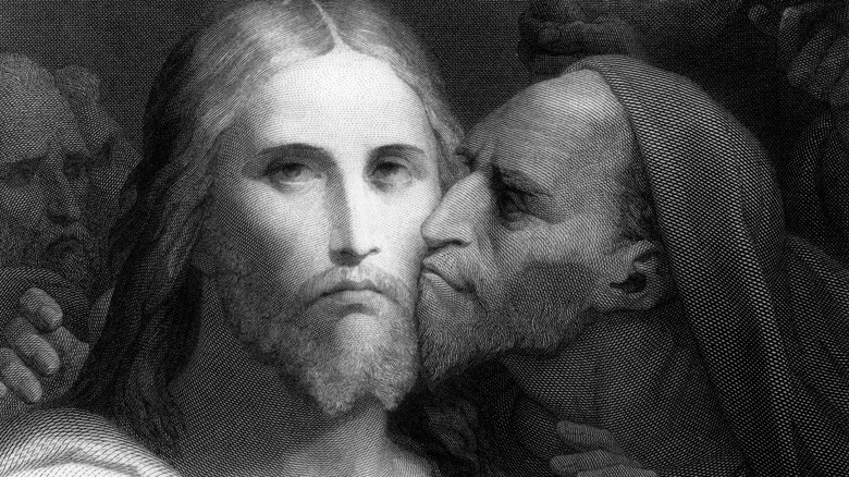 Judas kissing Jesus Christ