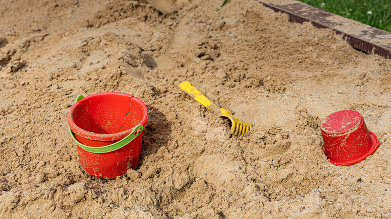 Boy playing sand