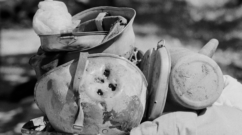 helmet riddled with bullet holes