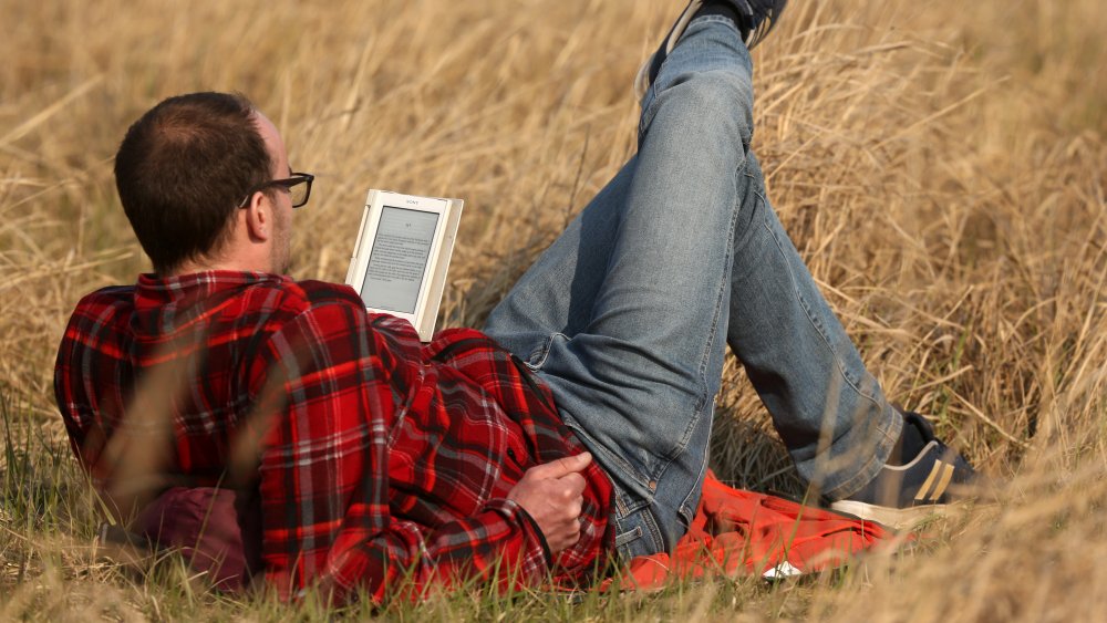 Man reading an eBook on an eReader